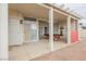 Covered patio with concrete floors featuring a pool table and a sliding glass door at 430 Nancy Dr, Henderson, NV 89015