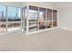 Bright sun room features large windows offering expansive city views at 4575 Dean Martin Dr # 912, Las Vegas, NV 89103