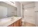 Bright bathroom with tile floor, shower-tub combination, and spacious countertops at 4630 Basilicata Ln # 203, North Las Vegas, NV 89084