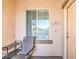Unit 203 entrance featuring a neutral door, window, and visible unit number at 4630 Basilicata Ln # 203, North Las Vegas, NV 89084
