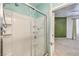 Modern shower with glass door and built-in shelving at 4630 Basilicata Ln # 203, North Las Vegas, NV 89084