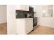Well-lit kitchen featuring stainless steel appliances and granite countertops at 4941 River Glen Dr # 4, Las Vegas, NV 89103
