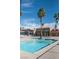 Sparkling community pool surrounded by desert landscaping and a recreation center provides an ideal space for relaxation at 4941 River Glen Dr # 4, Las Vegas, NV 89103