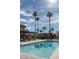 Sparkling community pool with adjacent recreation center featuring desert landscaping offers a relaxing and convenient amenity at 4941 River Glen Dr # 4, Las Vegas, NV 89103