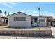 Charming single-story home featuring a freshly painted exterior and well-maintained landscaping at 517 Hopi Pl, Boulder City, NV 89005