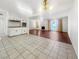 Spacious kitchen and living area featuring tile floors and a seamless flow for entertaining at 5305 Alta Dr, Las Vegas, NV 89107