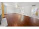 Spacious living room with wood flooring, fireplace and lots of natural light from the back door at 5305 Alta Dr, Las Vegas, NV 89107