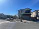 Charming two-story home with a well-maintained lawn and an attached two-car garage at 5773 Fresh Fields Ct, Las Vegas, NV 89118