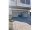 Attached garage with stone-accented exterior and space for parking and storage at 5773 Fresh Fields Ct, Las Vegas, NV 89118