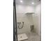Bright laundry room with tile floor, and a utility sink at 5773 Fresh Fields Ct, Las Vegas, NV 89118