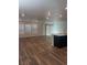 Open concept living room area featuring wood floors at 5773 Fresh Fields Ct, Las Vegas, NV 89118