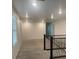 Second floor loft area with stairs and carpet floors, with lots of light at 5773 Fresh Fields Ct, Las Vegas, NV 89118