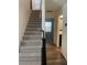View of staircase with carpet and railing at 5773 Fresh Fields Ct, Las Vegas, NV 89118