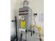 A modern, tankless water heater in the home ensures energy-efficient hot water on demand at 5773 Fresh Fields Ct, Las Vegas, NV 89118