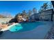 Stunning backyard pool with a rock slide, perfect for outdoor fun and relaxation at 6171 Whispering Sands Dr, Las Vegas, NV 89131