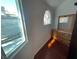 Bedroom with window and natural light with wooden dresser and hardwood flooring at 6171 Whispering Sands Dr, Las Vegas, NV 89131