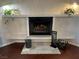 A charming fireplace with decorative tiles and stylish accents at 6171 Whispering Sands Dr, Las Vegas, NV 89131