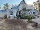 Charming single-Gathering home with unique lattice archway and landscaped front yard at 6171 Whispering Sands Dr, Las Vegas, NV 89131