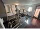 Home gym with workout equipment and rubber flooring for a comfortable exercise space at 6171 Whispering Sands Dr, Las Vegas, NV 89131