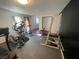 Home gym with workout equipment and rubber flooring for a comfortable exercise space at 6171 Whispering Sands Dr, Las Vegas, NV 89131