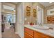 An ensuite bathroom is just off the office, offering convenience and style for your workday at 64 Strada Principale # 307, Henderson, NV 89011