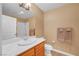 Bright bathroom featuring a walk-in shower, vanity sink, and modern fixtures at 64 Strada Principale # 307, Henderson, NV 89011