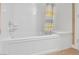 Bright bathroom featuring a shower-tub combination and neutral walls at 64 Strada Principale # 307, Henderson, NV 89011
