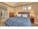 A bedroom featuring neutral walls and carpet, standard furniture, and minimal decor for a calming space at 64 Strada Principale # 307, Henderson, NV 89011