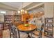 Charming dining area with stylish furnishings adjacent to a modern kitchen at 64 Strada Principale # 307, Henderson, NV 89011