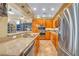 Well-equipped kitchen featuring stainless steel appliances and granite countertops at 64 Strada Principale # 307, Henderson, NV 89011