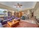 Inviting living area combines seating, dining and kitchen spaces, ideal for entertaining or relaxing in comfort at 64 Strada Principale # 307, Henderson, NV 89011