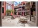 Charming courtyard with outdoor seating, perfect for relaxation and socializing at 64 Strada Principale # 307, Henderson, NV 89011