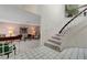 Entryway featuring a staircase, tile flooring, and glimpses of the formal living room at 6603 Vigo Rd, Las Vegas, NV 89146