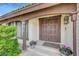 Inviting front door entrance with double doors and manicured landscaping at 6603 Vigo Rd, Las Vegas, NV 89146