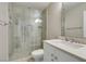 Modern bathroom features a glass shower enclosure, sleek vanity, and contemporary fixtures at 7131 Mission Hills Dr, Las Vegas, NV 89113