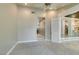 Large bedroom with a ceiling fan and doorway to other parts of the home at 7131 Mission Hills Dr, Las Vegas, NV 89113