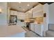 Bright kitchen equipped with stainless steel appliances and quartz countertops at 7131 Mission Hills Dr, Las Vegas, NV 89113