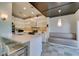 Modern kitchen featuring quartz countertops, stainless steel appliances, and a cozy breakfast nook at 7131 Mission Hills Dr, Las Vegas, NV 89113