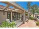 Charming outdoor patio with brick flooring, pergola, and comfortable seating perfect for outdoor gatherings and relaxation at 7131 Mission Hills Dr, Las Vegas, NV 89113