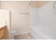 Bathroom featuring a vanity with a sink, a mirror, and a shower-tub combo at 7163 S Durango Dr # 108, Las Vegas, NV 89113