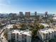 Stunning aerial view of condo complex with backdrop of the Las Vegas Strip, offering a premier location at 725 N Royal Crest Cir # 237, Las Vegas, NV 89169