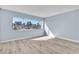 Bedroom with wood floors and a large window letting in natural light at 725 N Royal Crest Cir # 237, Las Vegas, NV 89169