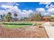 Beautiful outdoor putting green with a gazebo and meticulous landscaping for serene relaxation at 725 N Royal Crest Cir # 237, Las Vegas, NV 89169
