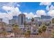 City view of community condos featuring Las Vegas skyline in the background at 725 N Royal Crest Cir # 237, Las Vegas, NV 89169