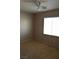 Neutral bedroom with window and ceiling fan at 8348 Mokena Ave, Las Vegas, NV 89178
