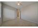 This is a spacious bedroom with a ceiling fan and closet at 8348 Mokena Ave, Las Vegas, NV 89178