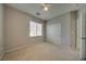 This bedroom has carpet and neutral walls, plus a closet and bright window at 8348 Mokena Ave, Las Vegas, NV 89178