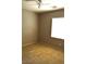 Neutral bedroom with carpeted floors, a ceiling fan, and a window providing natural light at 8348 Mokena Ave, Las Vegas, NV 89178
