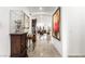 Hallway featuring tile floors, recessed lighting, decorative artwork and furnishings at 8415 Iron Heart Ln, Las Vegas, NV 89113