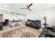 A large loft area featuring comfortable seating and entertainment space at 8415 Iron Heart Ln, Las Vegas, NV 89113